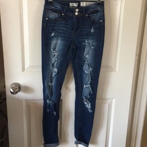 Skinny ankle ripped jeans